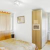 Appartamento 4.5 Locali all'Ultimo Piano a Breganzona con Balcone Panoramico e Posto Auto